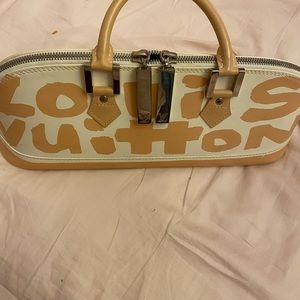 Like new. Special edition Louis Vuitton tan and white